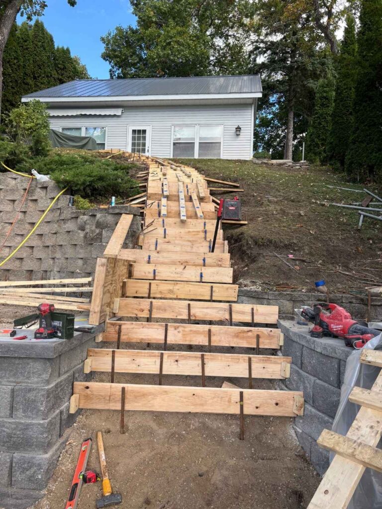 hillside concrete stair forms rebar lakefront hartland 1