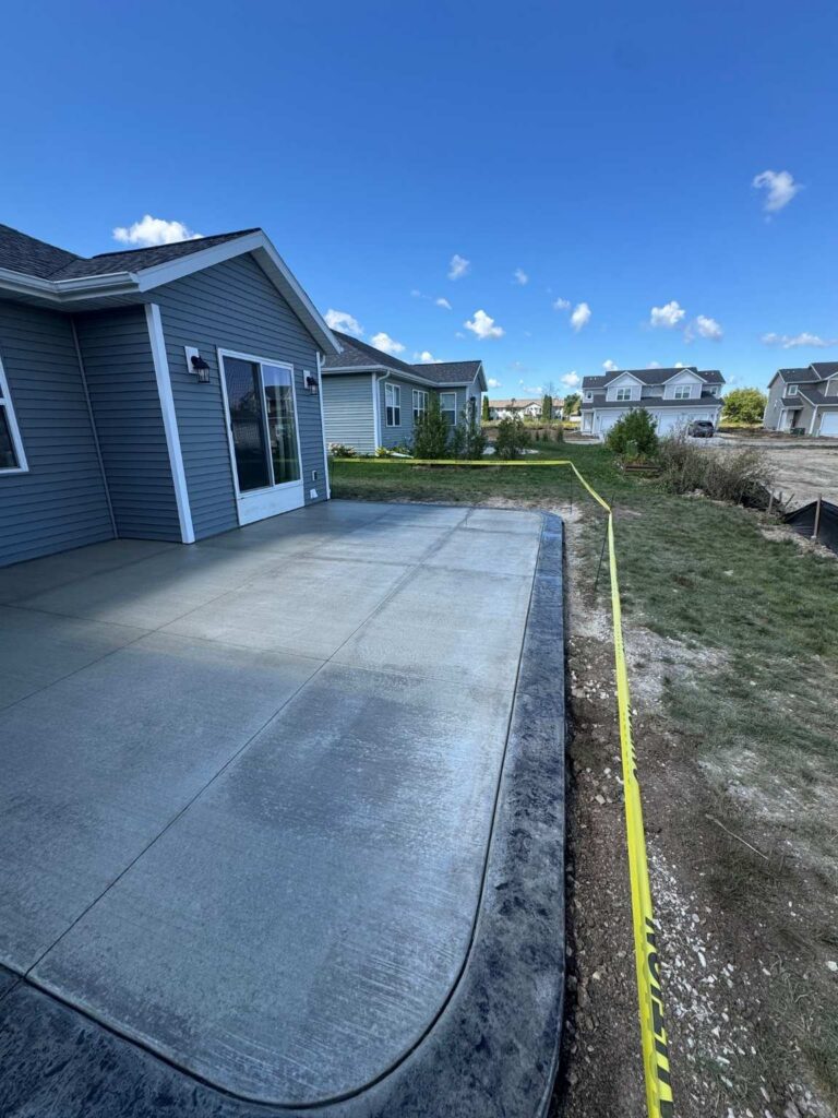 jackson-brushed-concrete-patio-stamped-slate-border
