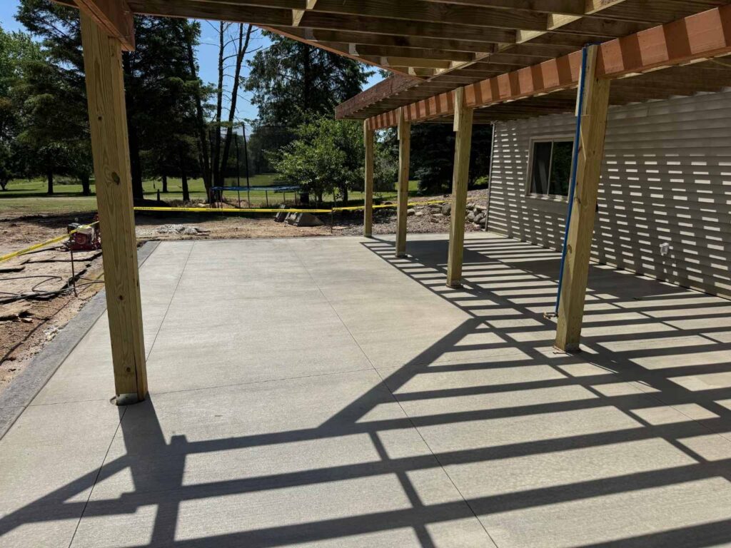 under-deck-brushed-concrete-patio-burlington-wisconsin